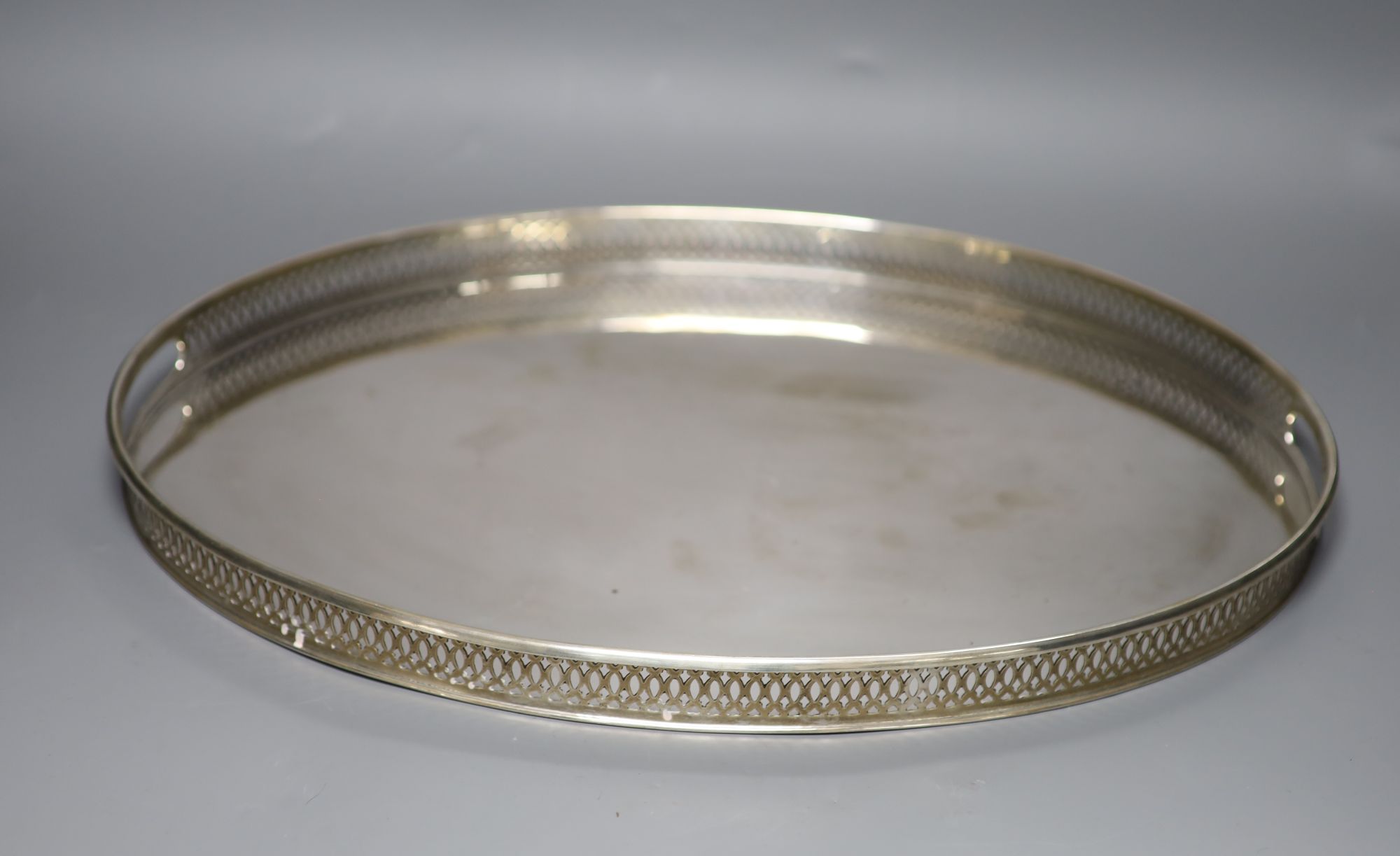 An Italian 800 standard white metal oval tray with raised pierced galleried edge, 47.3cm, 22oz